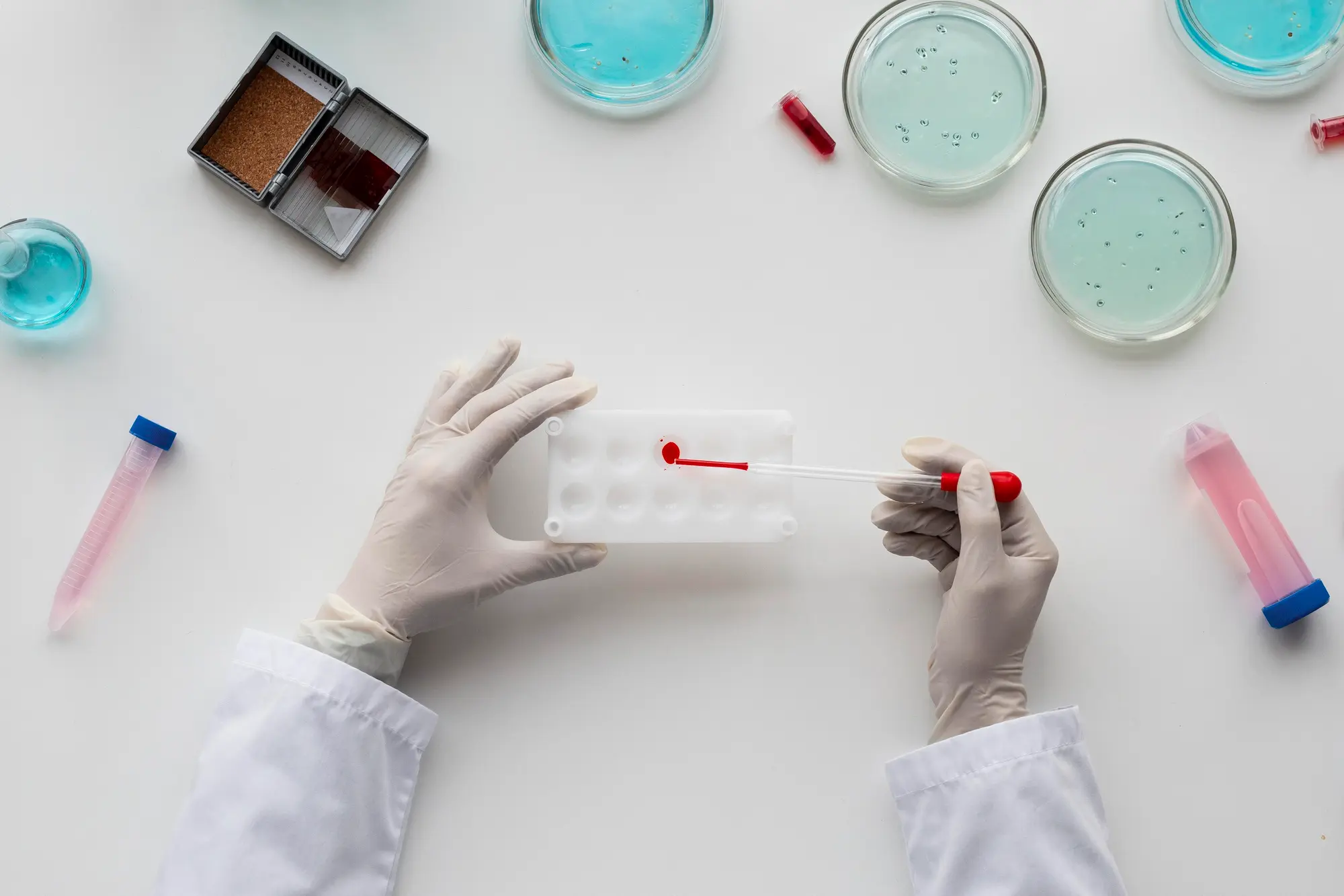close-up-scientist-holding-pipette_23-2148882089.webp