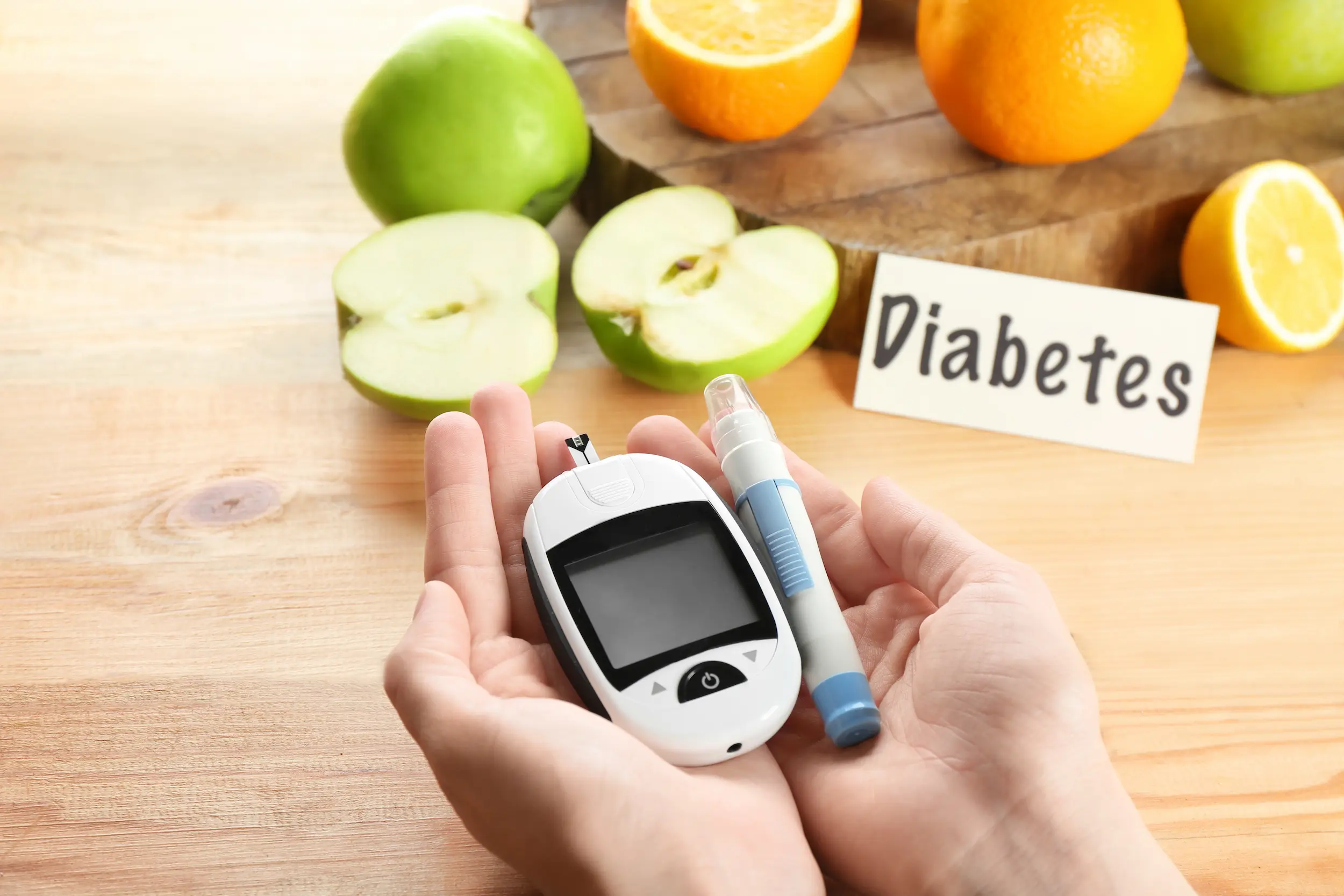 woman-holding-digital-glucometer-lancet-pen-table-diabetes-diet_49288606.webp